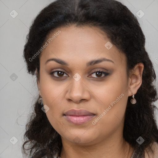 Joyful latino young-adult female with long  brown hair and brown eyes
