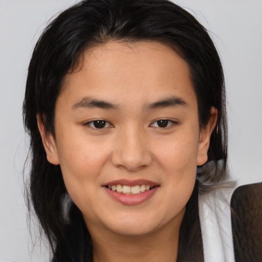 Joyful asian young-adult female with medium  brown hair and brown eyes