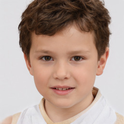 Joyful white child male with short  brown hair and brown eyes