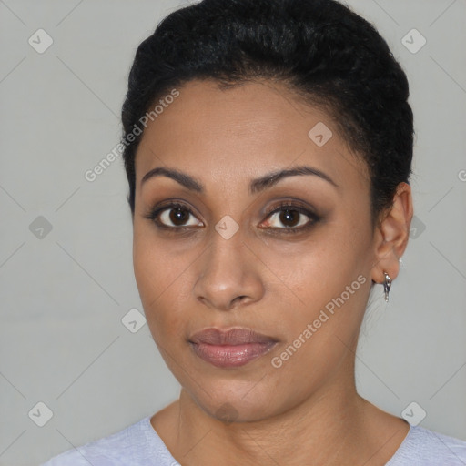 Joyful latino young-adult female with short  black hair and brown eyes