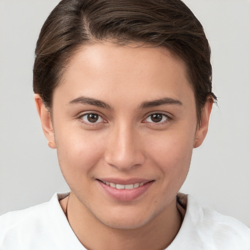 Joyful white young-adult female with short  brown hair and brown eyes