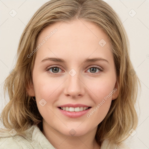 Joyful white young-adult female with medium  brown hair and green eyes