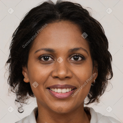 Joyful black young-adult female with medium  brown hair and brown eyes