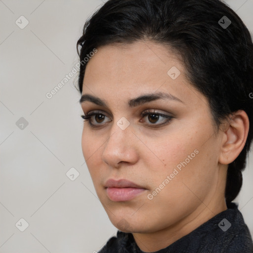 Neutral white young-adult female with short  brown hair and brown eyes