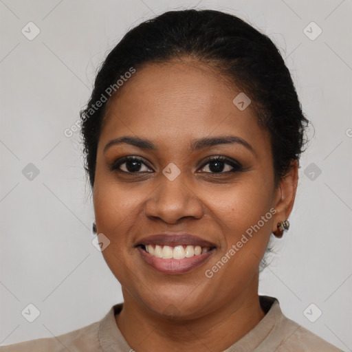 Joyful latino young-adult female with short  brown hair and brown eyes