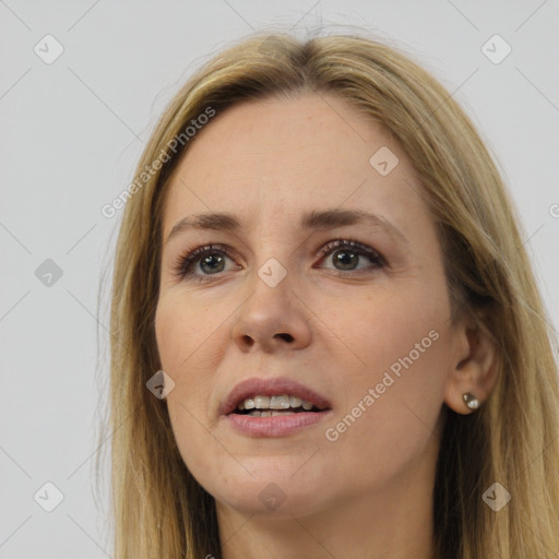 Joyful white young-adult female with long  brown hair and brown eyes