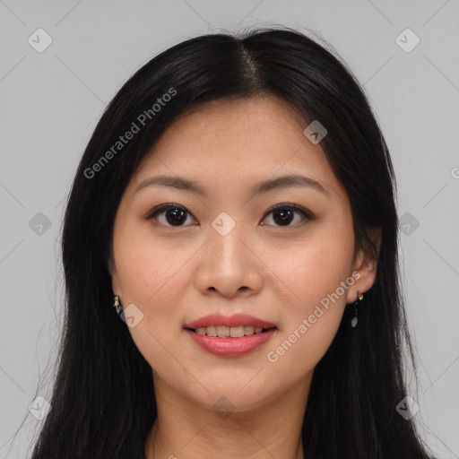 Joyful asian young-adult female with long  brown hair and brown eyes