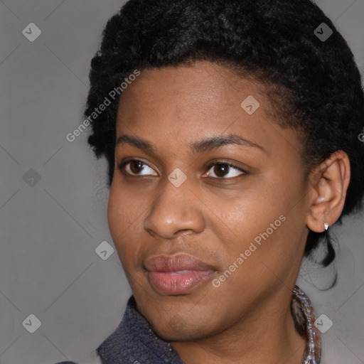 Joyful black young-adult female with medium  black hair and brown eyes