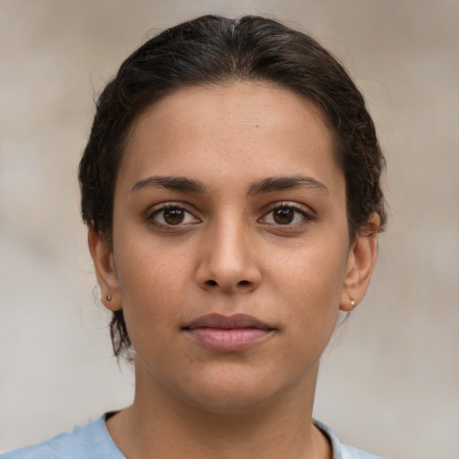 Neutral white young-adult female with medium  brown hair and brown eyes