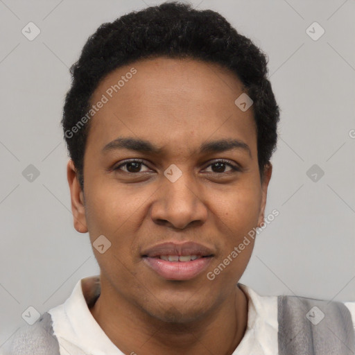 Joyful black young-adult male with short  black hair and brown eyes
