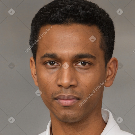 Neutral latino young-adult male with short  black hair and brown eyes