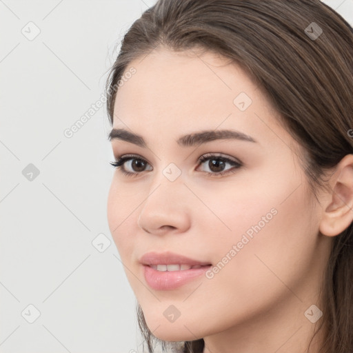 Neutral white young-adult female with long  brown hair and brown eyes