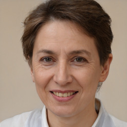 Joyful white adult female with short  brown hair and brown eyes