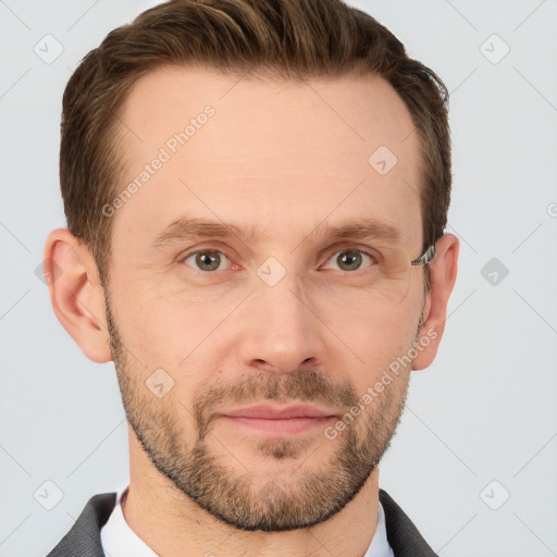 Joyful white adult male with short  brown hair and grey eyes