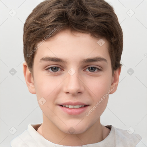 Joyful white child male with short  brown hair and brown eyes