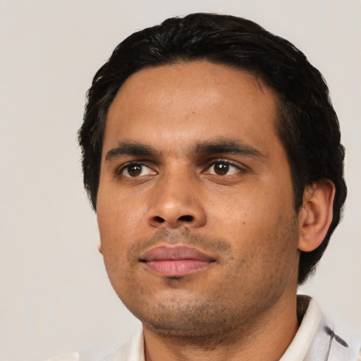 Neutral latino young-adult male with short  black hair and brown eyes