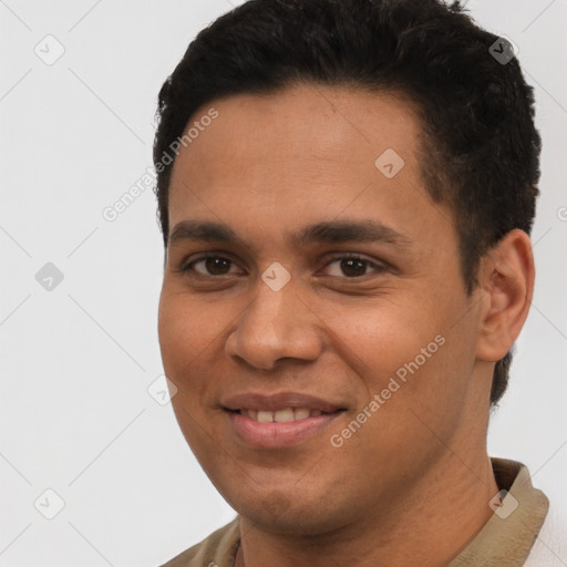 Joyful white young-adult male with short  black hair and brown eyes