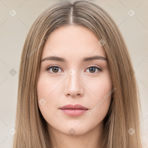 Neutral white young-adult female with long  brown hair and brown eyes