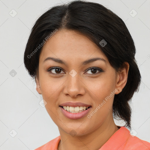 Joyful latino young-adult female with medium  brown hair and brown eyes