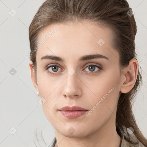 Neutral white young-adult female with medium  brown hair and grey eyes