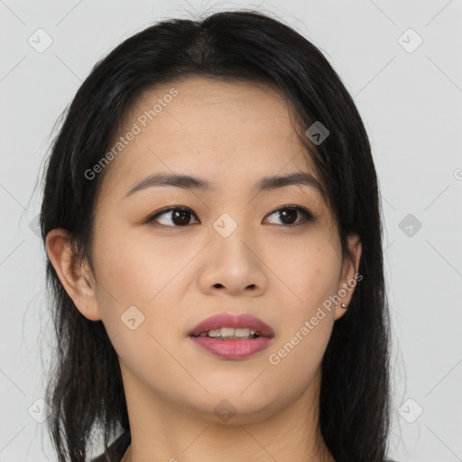 Joyful asian young-adult female with long  brown hair and brown eyes