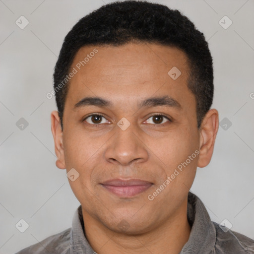 Joyful latino adult male with short  black hair and brown eyes