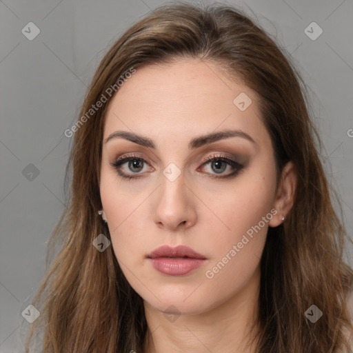 Neutral white young-adult female with long  brown hair and brown eyes