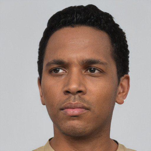 Neutral black young-adult male with short  black hair and brown eyes