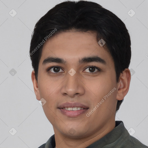 Joyful asian young-adult male with short  black hair and brown eyes