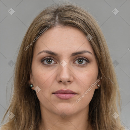 Neutral white young-adult female with long  brown hair and brown eyes