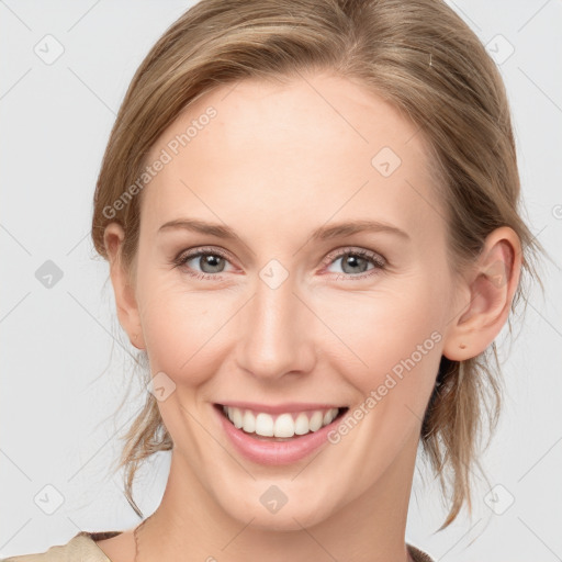 Joyful white young-adult female with medium  brown hair and blue eyes