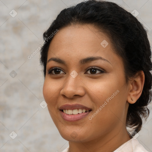 Joyful latino young-adult female with medium  brown hair and brown eyes