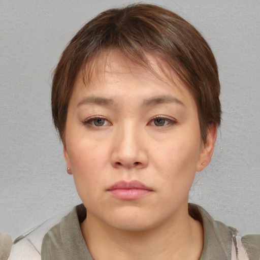 Neutral asian young-adult female with short  brown hair and brown eyes