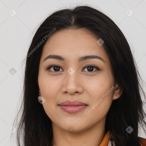 Joyful asian young-adult female with long  brown hair and brown eyes