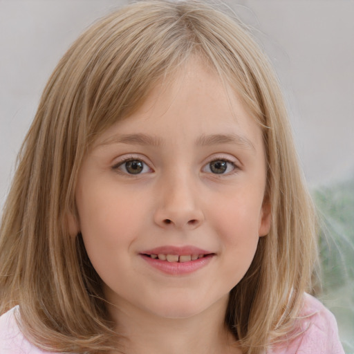 Joyful white child female with medium  brown hair and grey eyes