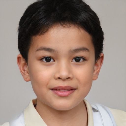 Joyful asian child female with short  brown hair and brown eyes