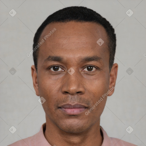 Neutral black young-adult male with short  black hair and brown eyes