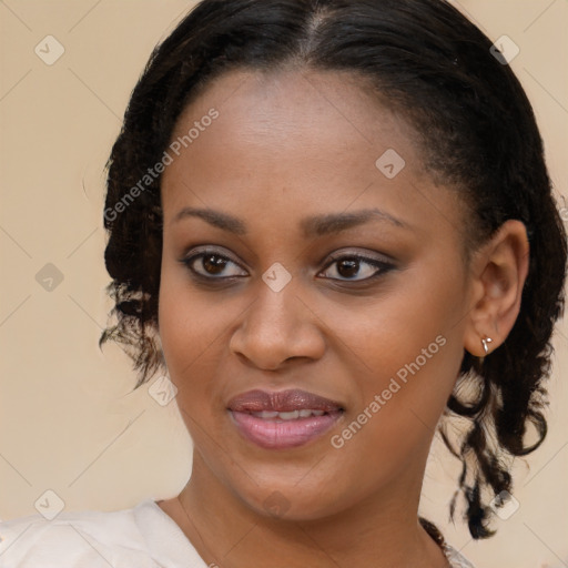 Joyful black young-adult female with medium  brown hair and brown eyes
