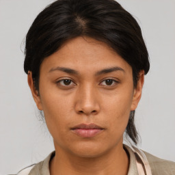 Neutral asian young-adult female with medium  brown hair and brown eyes