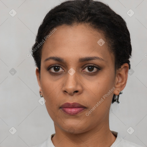 Neutral black young-adult female with short  brown hair and brown eyes