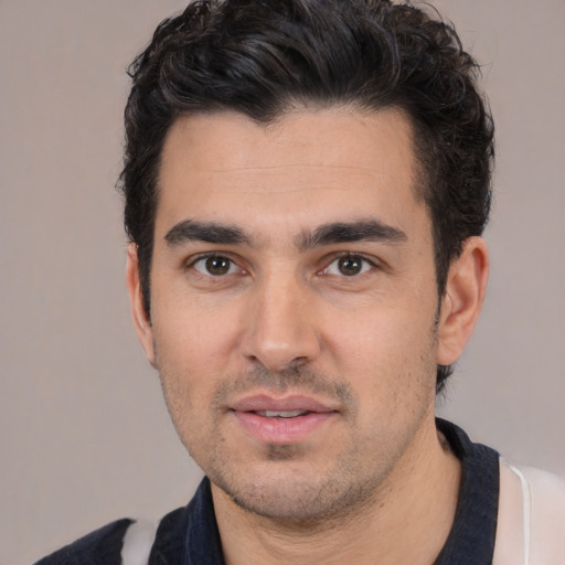 Neutral white young-adult male with short  black hair and brown eyes