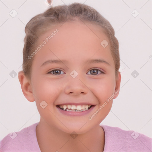 Joyful white child female with short  brown hair and brown eyes