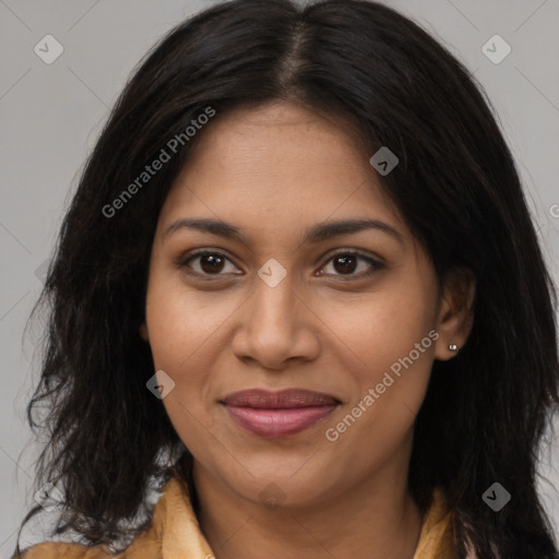 Joyful latino young-adult female with long  brown hair and brown eyes