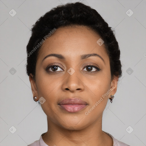 Joyful latino young-adult female with short  black hair and brown eyes