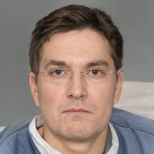 Neutral white adult male with short  brown hair and brown eyes