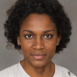 Neutral black young-adult female with short  brown hair and brown eyes