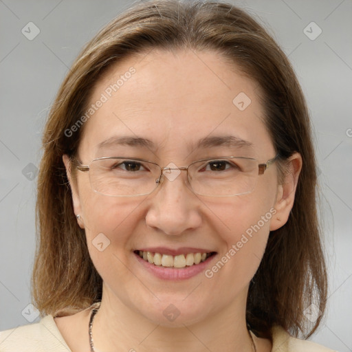 Joyful white adult female with medium  brown hair and brown eyes