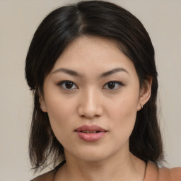 Neutral asian young-adult female with medium  brown hair and brown eyes