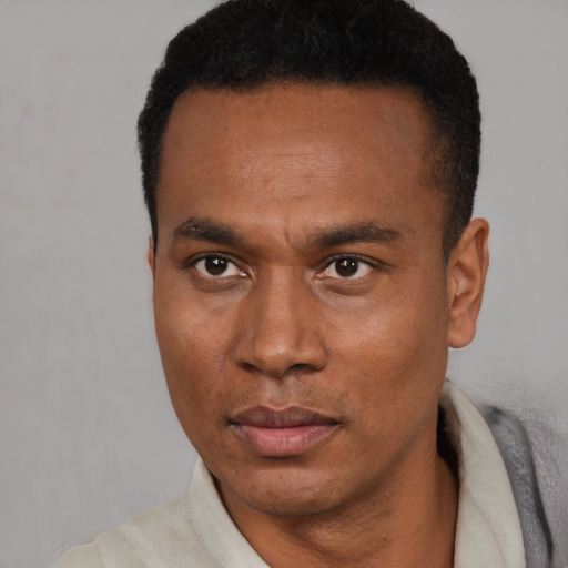 Neutral black young-adult male with short  black hair and brown eyes