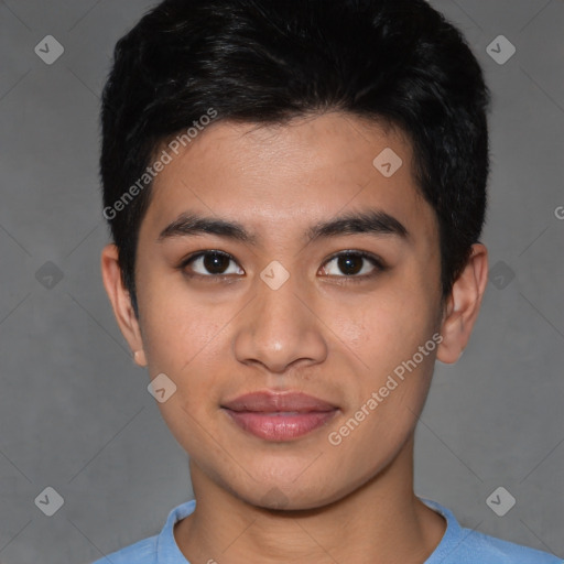 Joyful asian young-adult male with short  brown hair and brown eyes